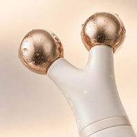 Rose-gold conductive spheres close-up